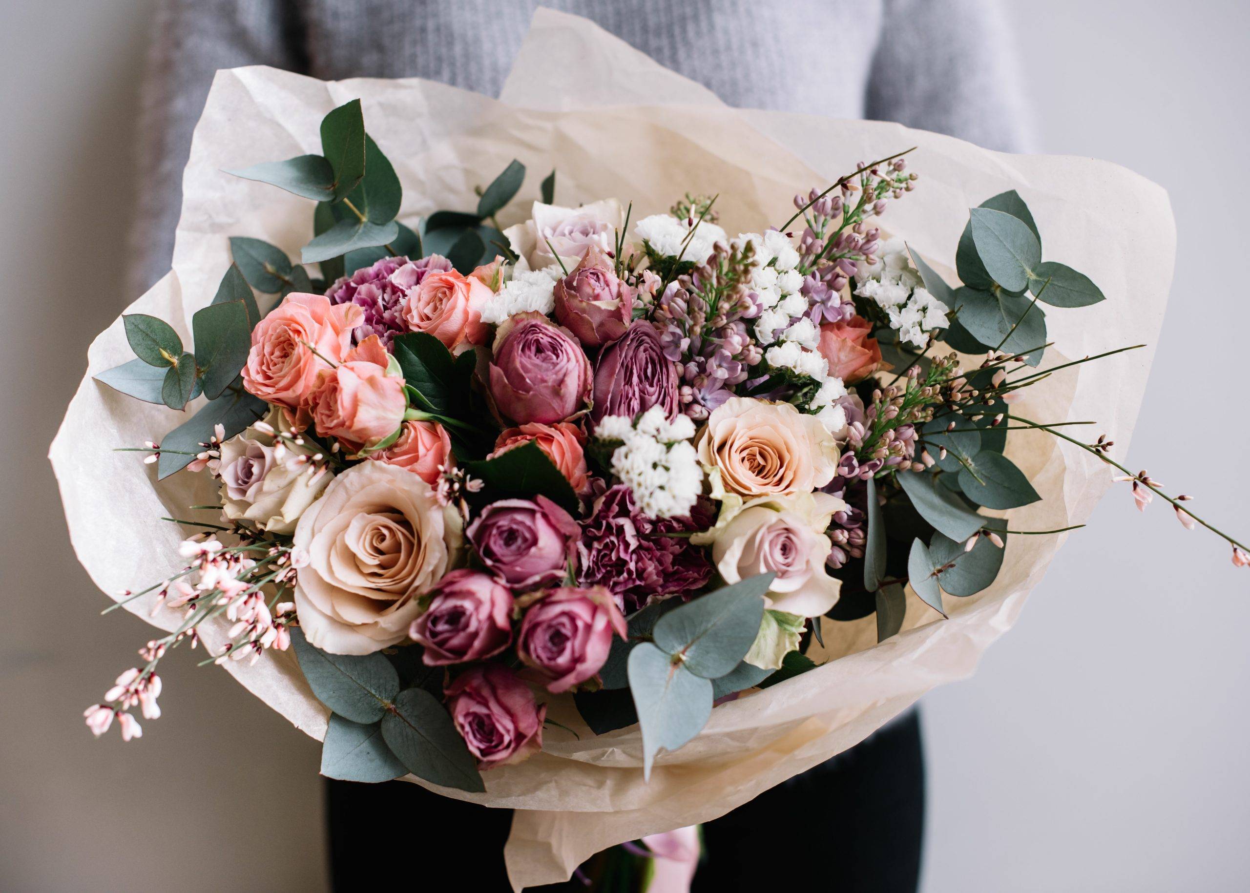 Young Florist Woman Holding Freshly Made Blossoming Flower Bouqu